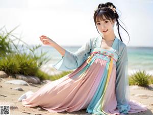 A woman in a kimono posing for a picture.