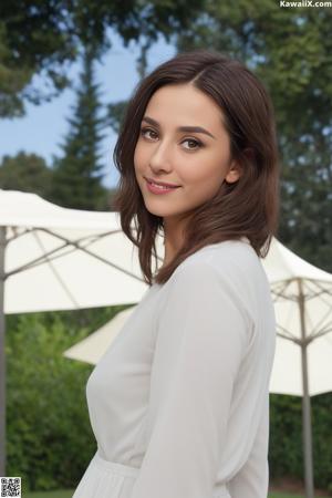 A woman in a blue shirt leaning against a tree.